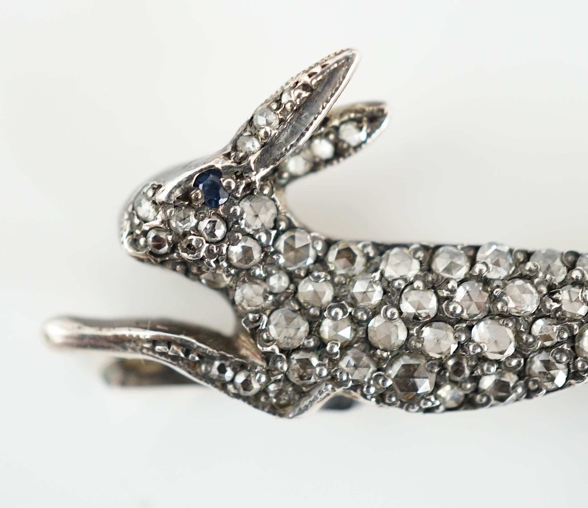An Edwardian gold, silver and rose cut diamond cluster set hare brooch